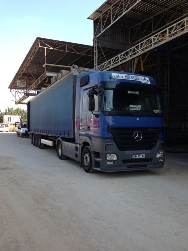 export truck leaving factory